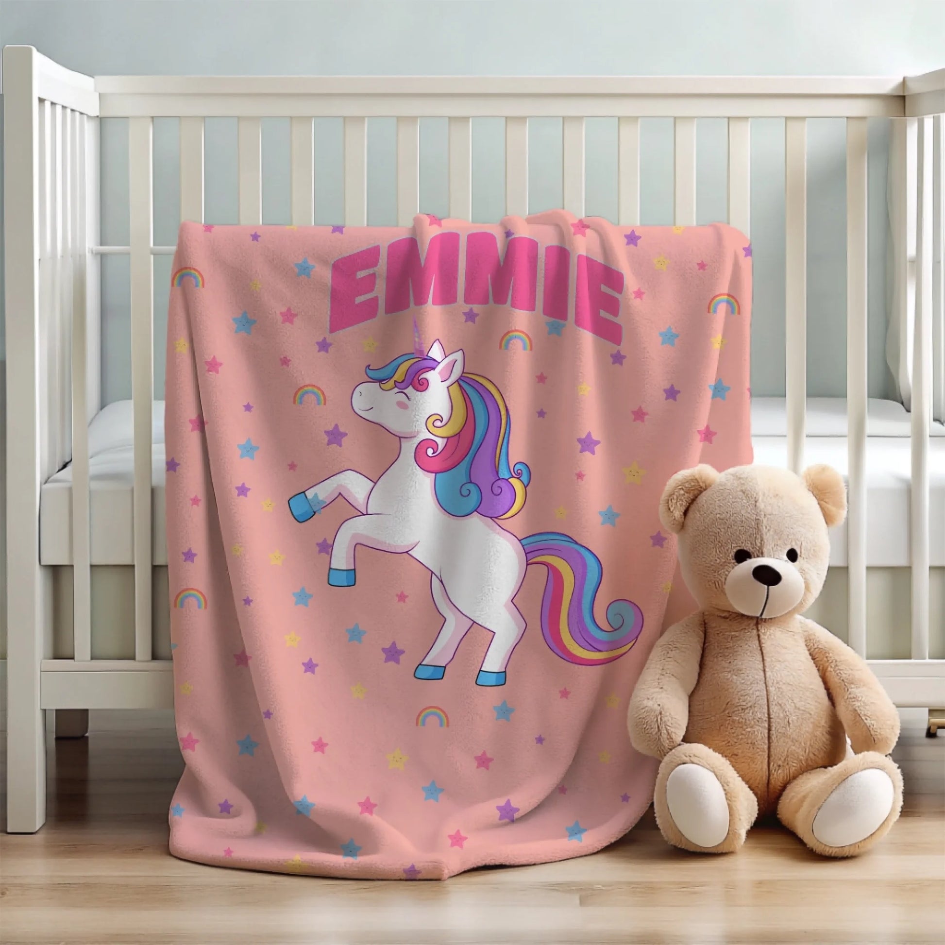 Misty Rose Magical Unicorn Blanket laid on the crib