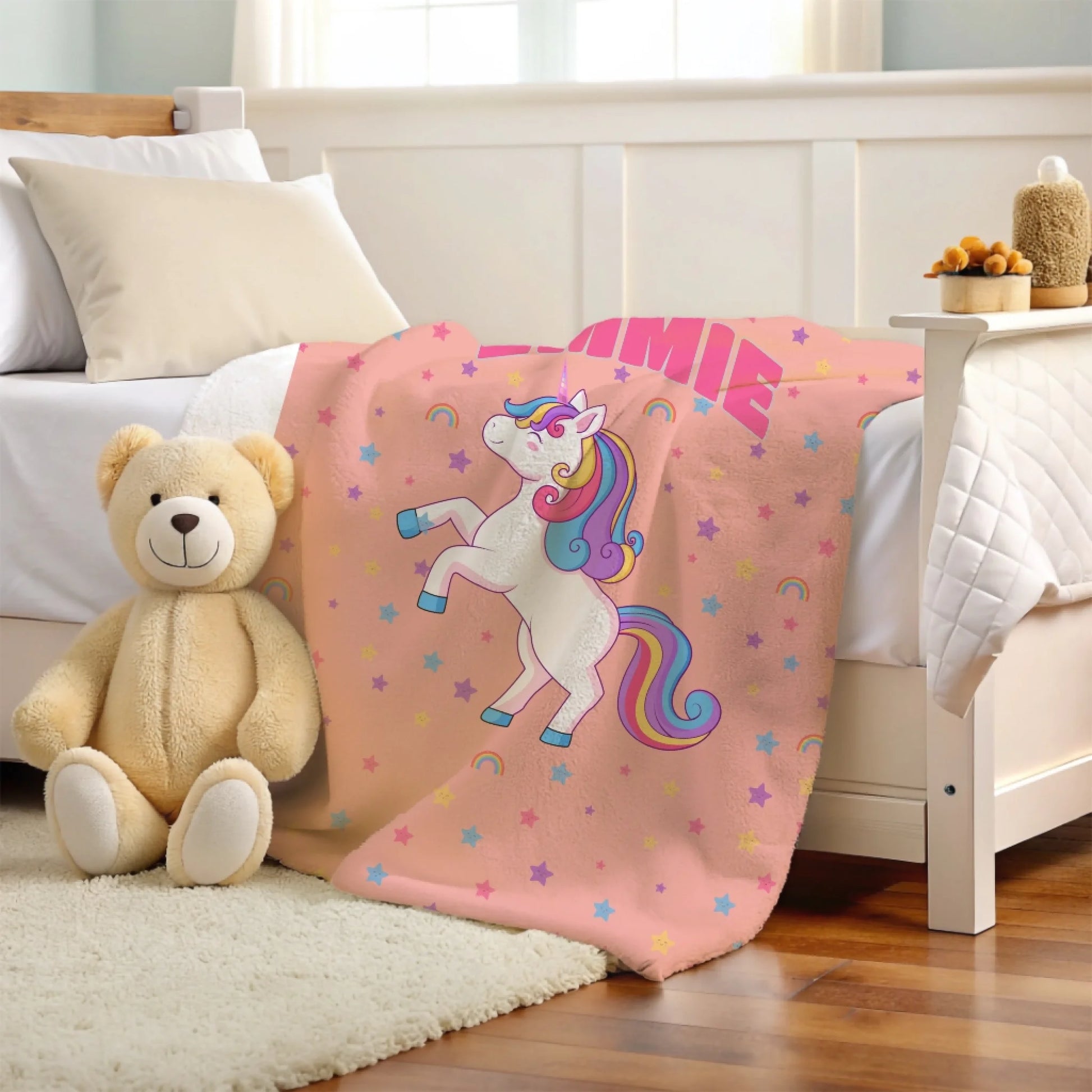 Misty Rose Magical Unicorn Blanket laid on the bed