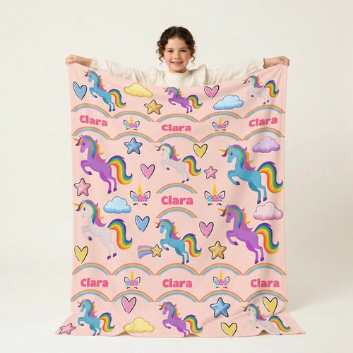 Clara with rainbow unicorn blanket