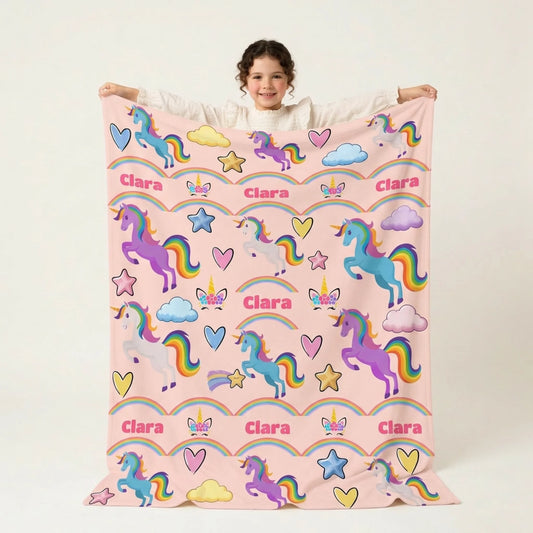 Clara with rainbow unicorn blanket