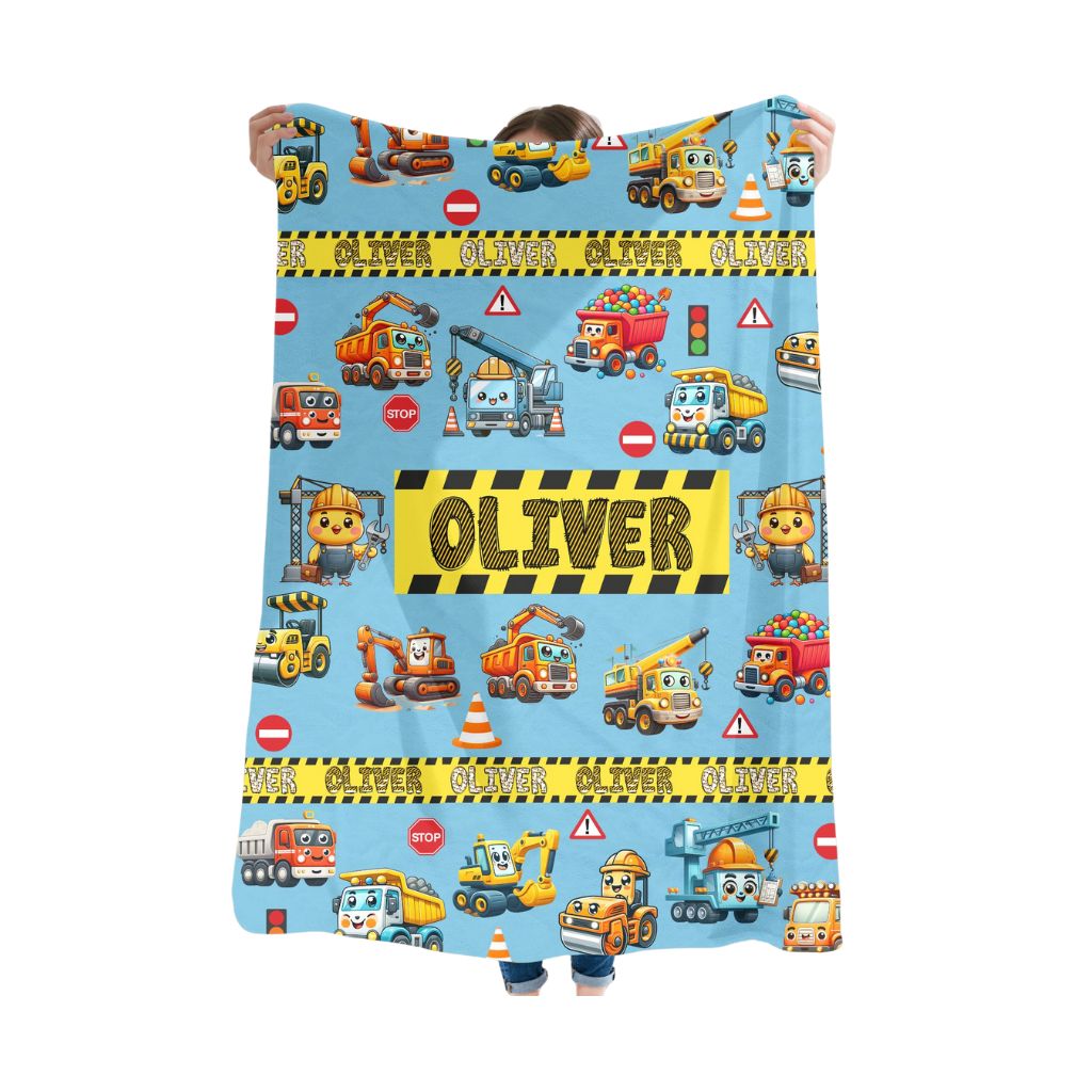 A person holding a sky blue color Kids Personalized construction vehicle blanket 